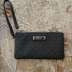 Michael Kors medium sized Jet set wristlet, black and grey, like new